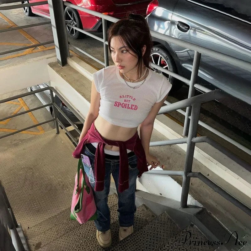 A Little Bit Spoiled Graceful White Graphic Crop Top Shirts & Tops